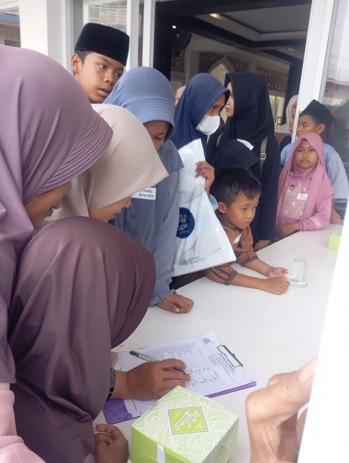 QORI Jadi Sponsor Apparel Busana Muslim dalam Santunan Yatim dan Dhuafa Amanah Zakat Depok